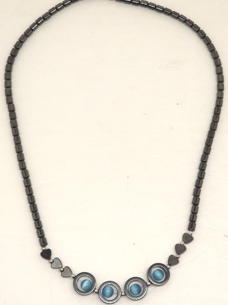 dark grey beaded heart and tube cats eye blue circle necklace 15