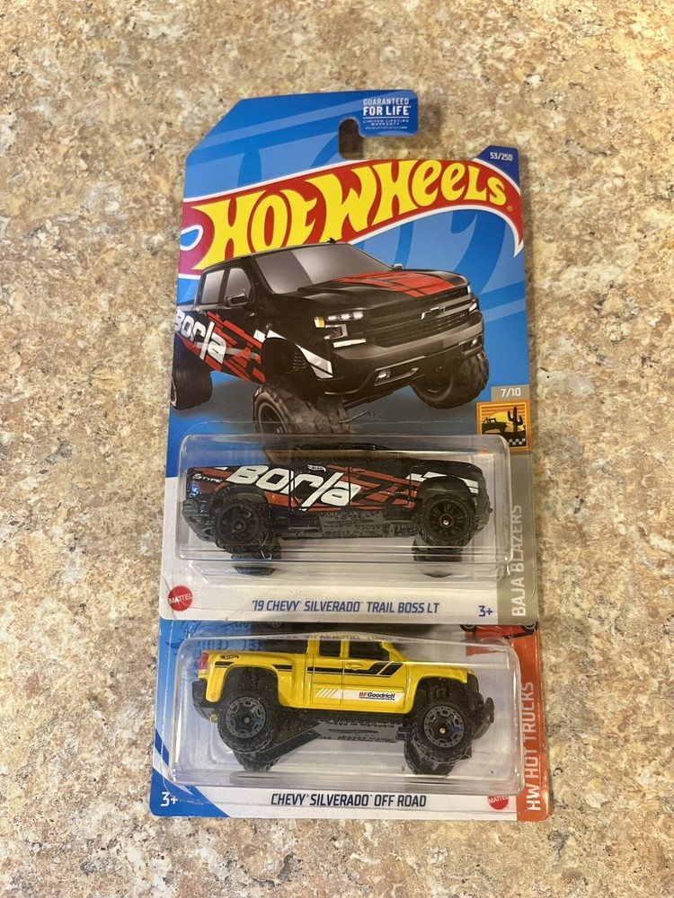 2021 Hot Wheels  Chevy Silverado Off Road Yellow & 19’ Trail Boss Black Lot Of 2