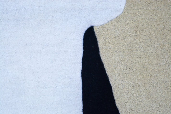 NZ Wool Hand Tufted Rug in a sophisticated white, beige, and black design. Craft