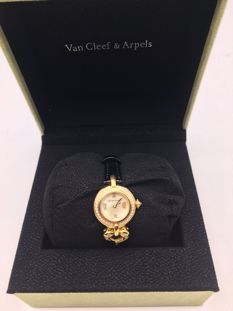 Van Cleef & Arpels Woman diamond BezelWatch White Dial Gold Case Black Band