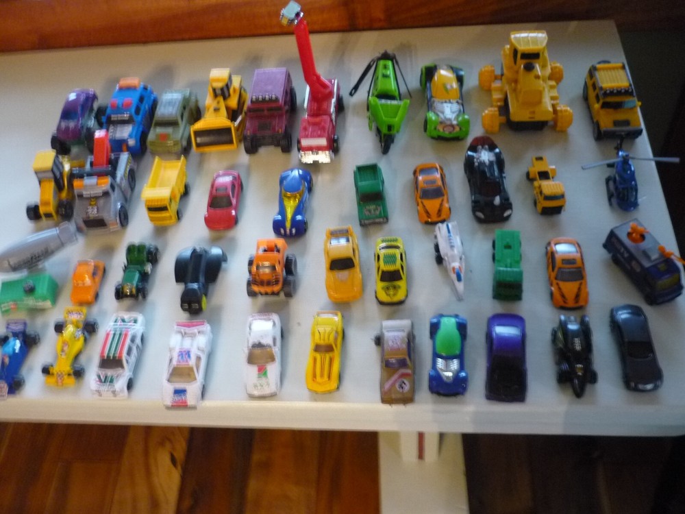 LOT OF 42 VINTAGE CARS VANS RACE CARS GOODYEAR BLIMP CONSTRUCTION TOW TRUCK