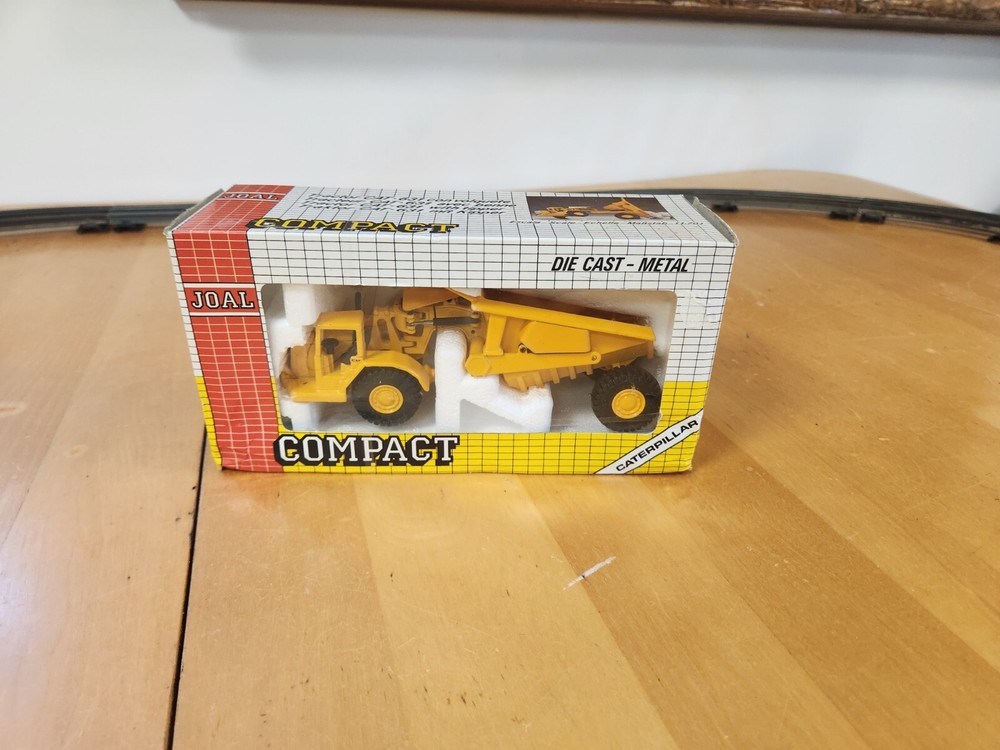 Joal #222 Compact Caterpiller Tractor CAT 631 with tipper 1/7O Scale Diecast