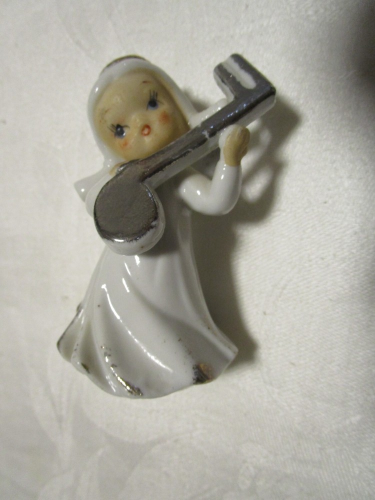 Vintage Porcelain Angel Figurine holding a Musical Note Chase 3.5