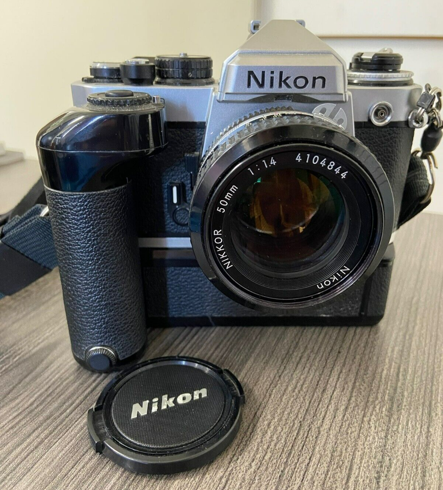 Nikon FE2 Camera with MD-12 Motor Drive Strap and Lens Cap No Box