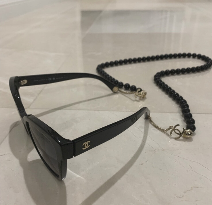 Chanel Butterfly Sunglasses with Elegant Pearl Necklace Accent