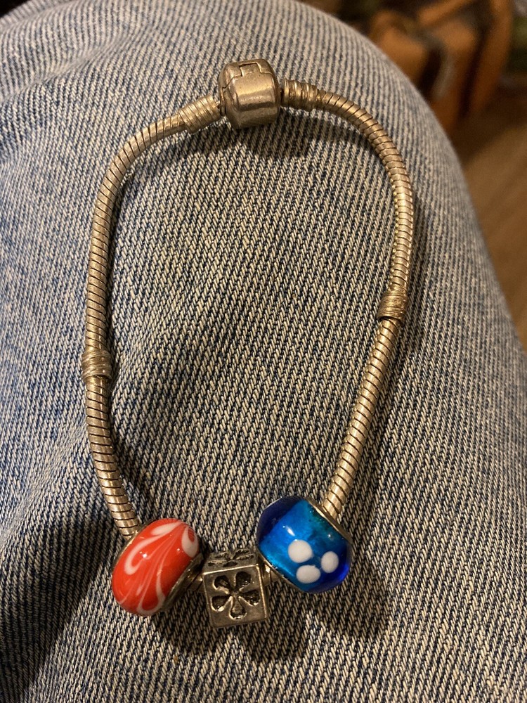 Sterling silver bracelet with silver charm and 2 ceramic colored charms