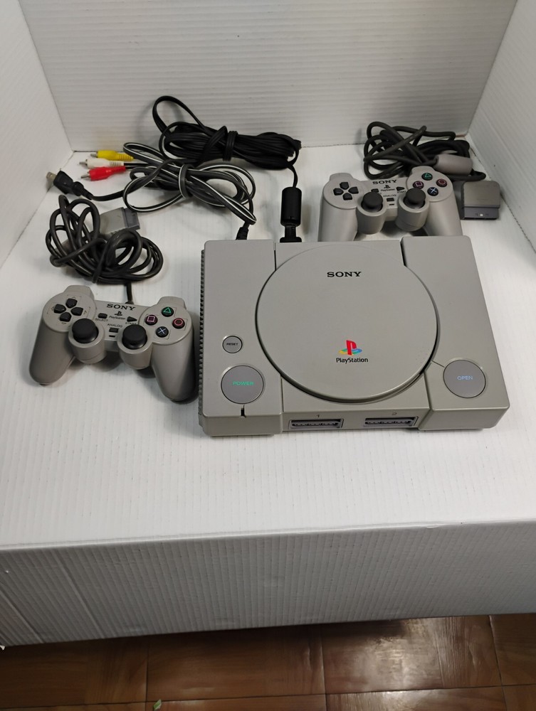 Sony PlayStation 1 Console with Two Controllers and Original Cables