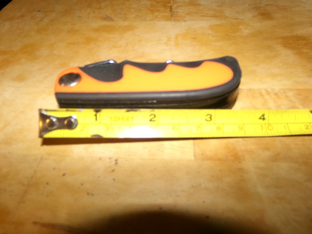 FOLDING UTILITY KNIFE WITH A LIGHT PLASTIC ORANGE FOLDING UTILITY KNIFE-BELTHOLD