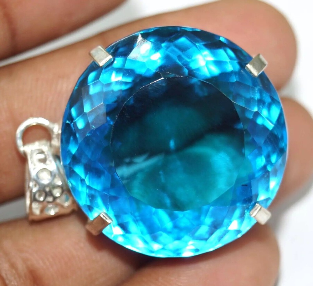 94.66 Ct Natural Blue Topaz Round Cut Loose Gemstone in 925 Solid Silver Pendant