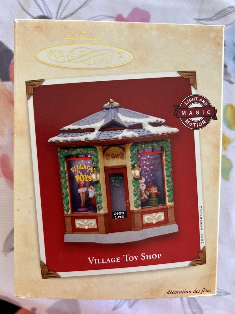 Hallmark 2002 Village Toy Shop Magic Light & Motion Keepsake Ornament MIB