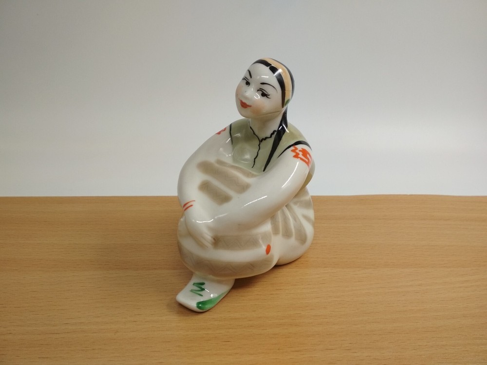 Porcelain figurine of the USSR, the girl sat down and thought, *126