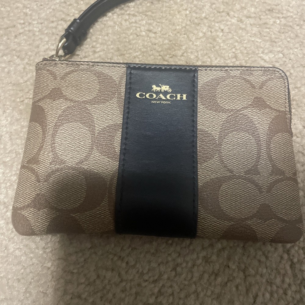 Coach Corner Zip Wristlet In Signature Canvas With Stripe