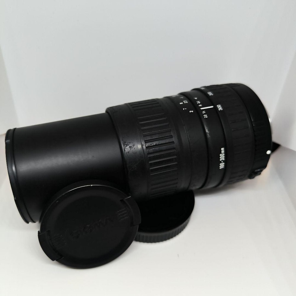 Sigma 100-300mm F4.5-6.7 Ultra Telephoto Zoom Lens for Canon EOS Kiss DSLR Cameras  
