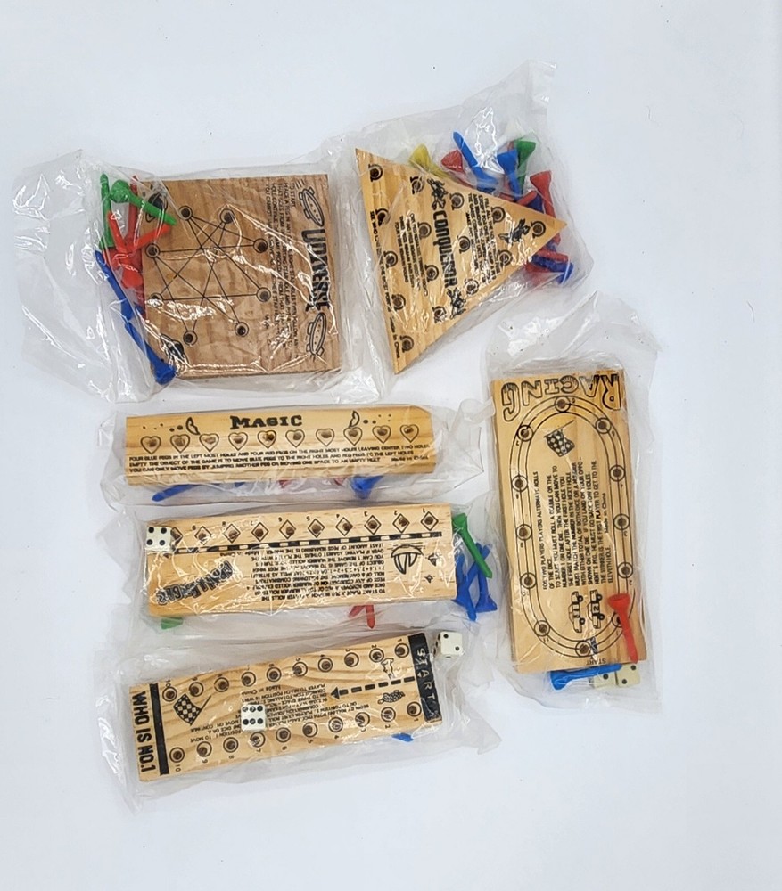 new vtg wooden teaser game set of  6 brain teaser games in plastic