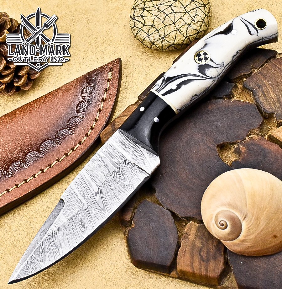 HERMOSO CUCHILLO DE CAZA DAMASCO CON REMOLINO RESINA NEGRO Y MANGO REFORZADO
