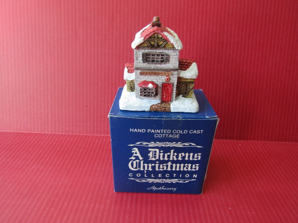 A Dickens Christmas Collection Hand Painted Cold Cast Cottage Apothecary