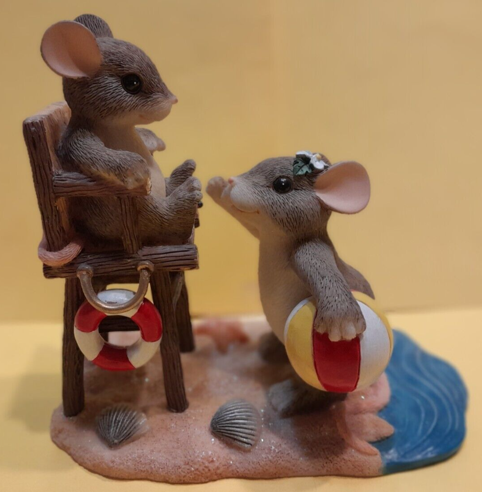 Charming Tails, A Real Lifesaver. Little mouse is the lifeguard at the beach