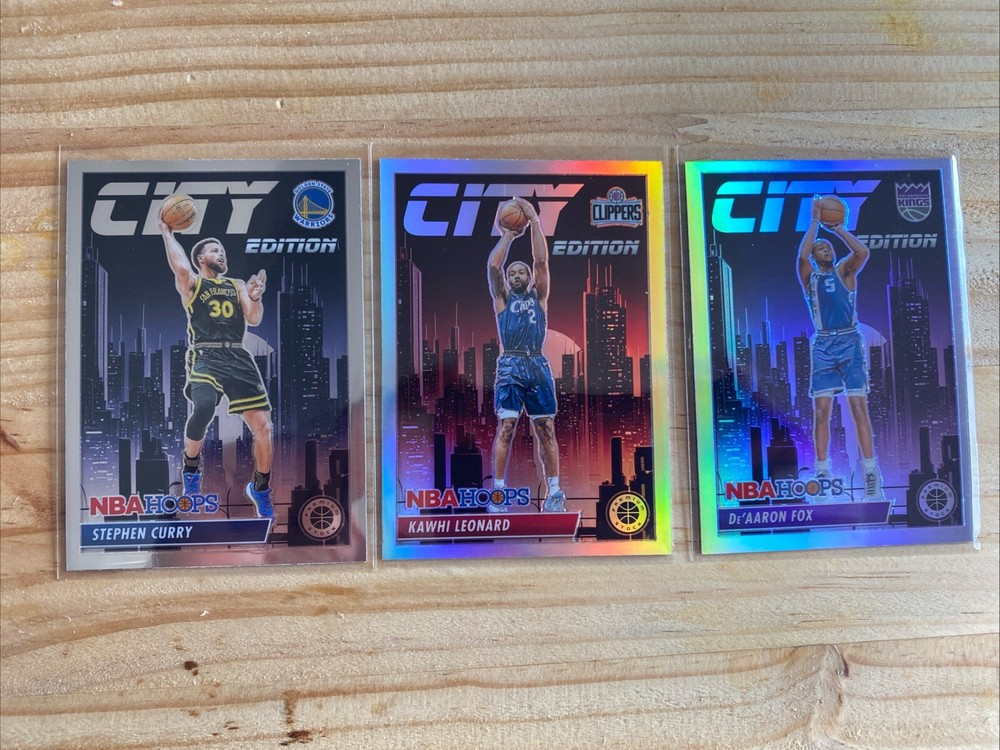 Stephen Curry, De’Aaron Fox, Kawhi Leonard 23-24Hoops Premium Stock City Edition