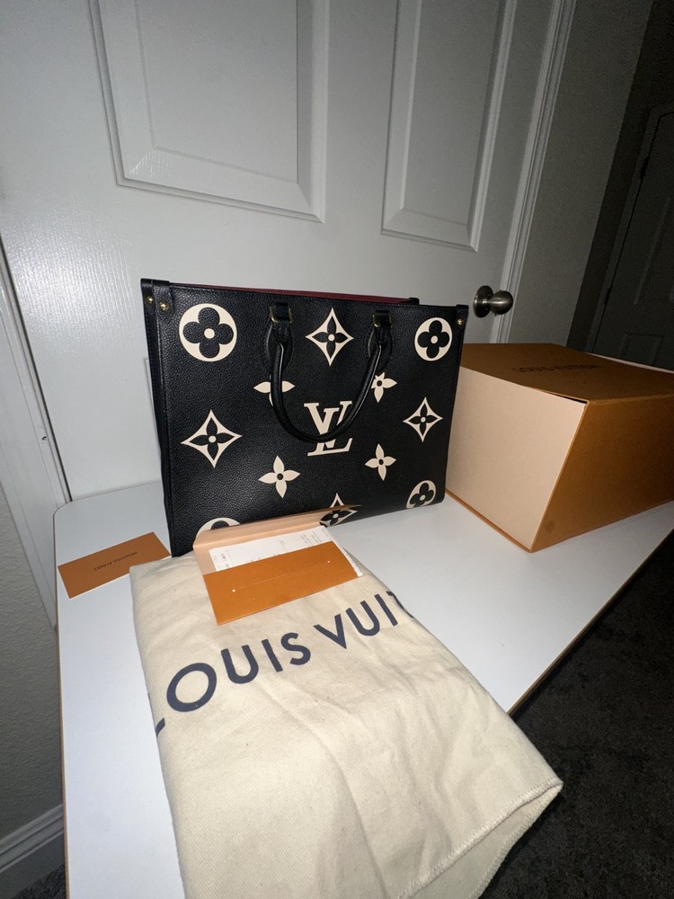 Louis Vuitton OnTheGo MM Tote in Black Beige Bicolor Monogram Empreinte Leather