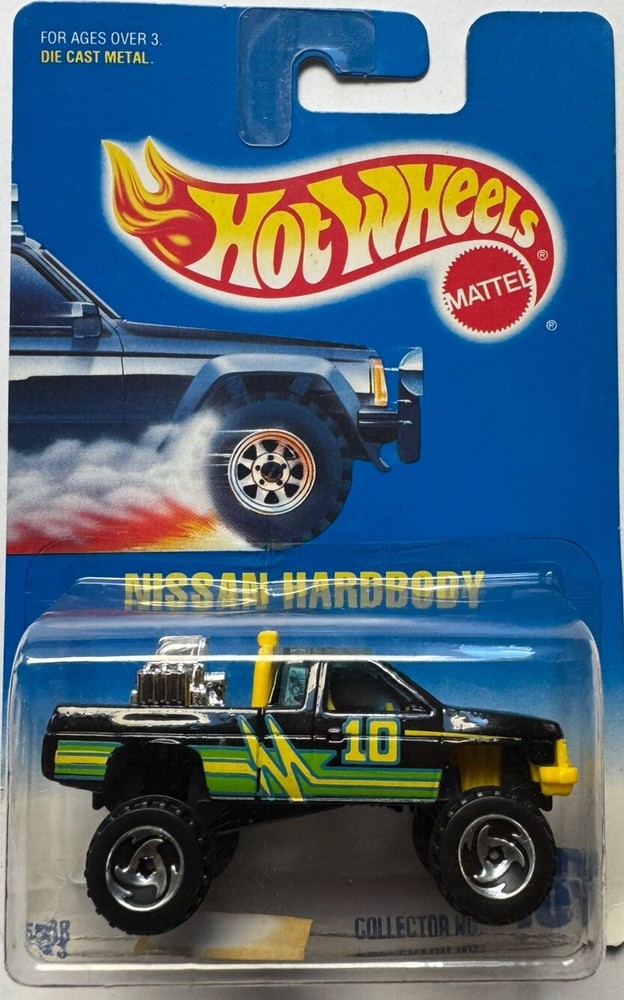 1992 Hot Wheels Nissan Hardbody Col. #131 (Black & Yellow) (Razor Hub Wheels)