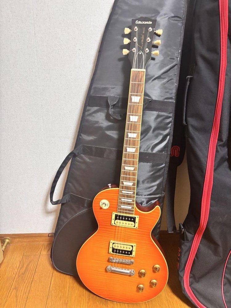 Edwards Les Paul Electric Guitar in Orange with Secure Packaging
