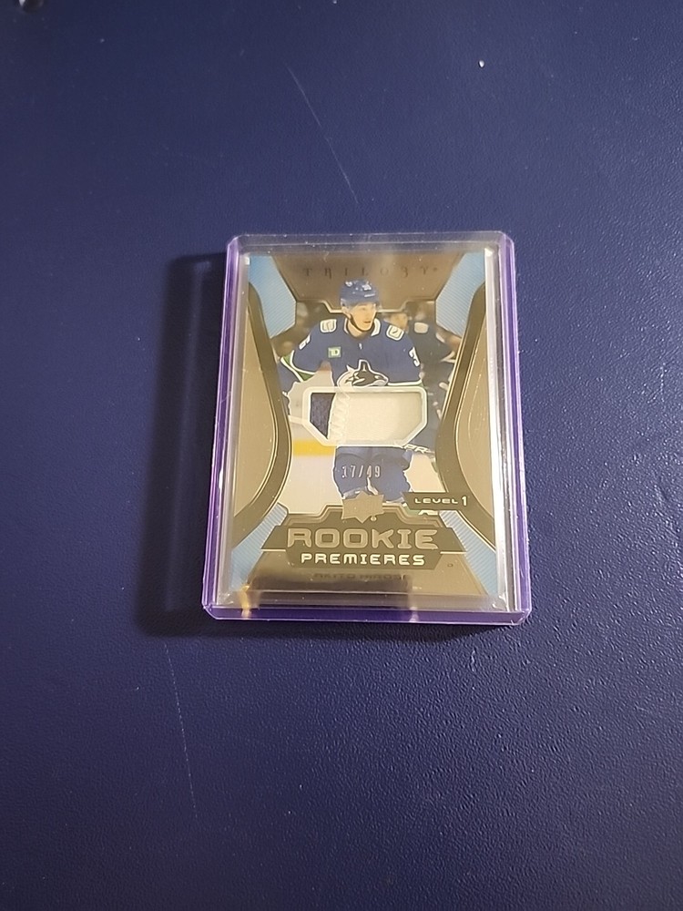 2023-24 Upper Deck Trilogy - Common Rookies Patch #117 Akito Hirose /49 (MEM,...