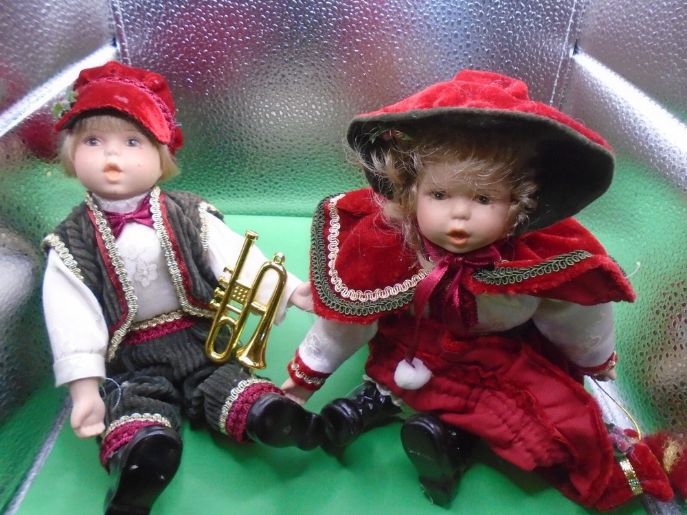 Cute Christmas hanging ornaments with German girl and boy in velvet outfits