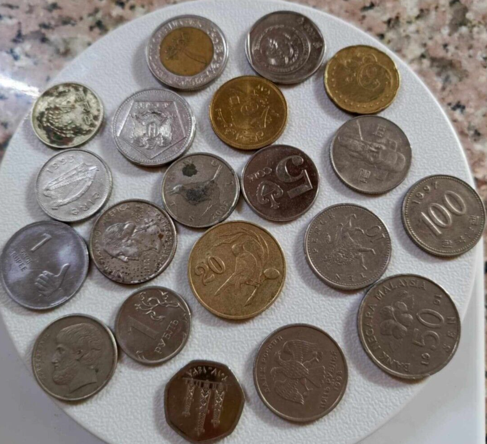 A collection of various ancient world coins - rare and with distinctive designs