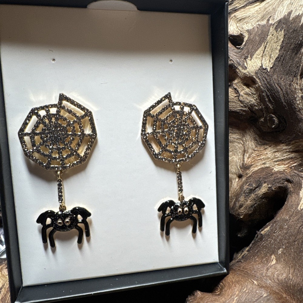 Spiderweb earrings with gold accents and black spider charm