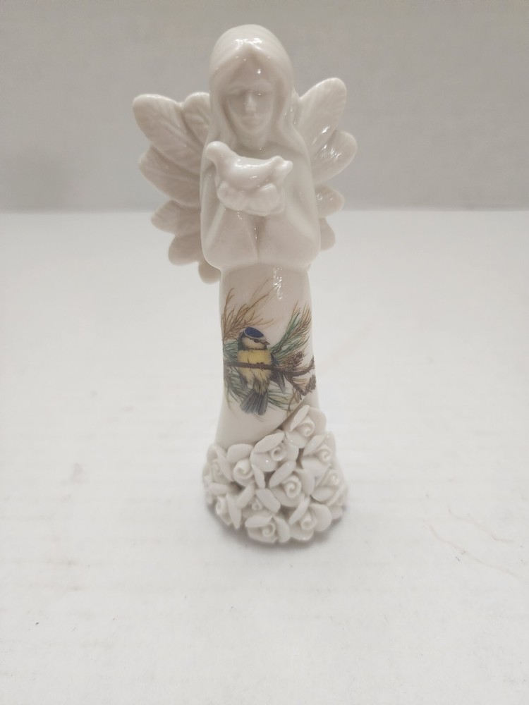Porcelain Angel Figurine Holding Bird with Blue Bird Dress Design