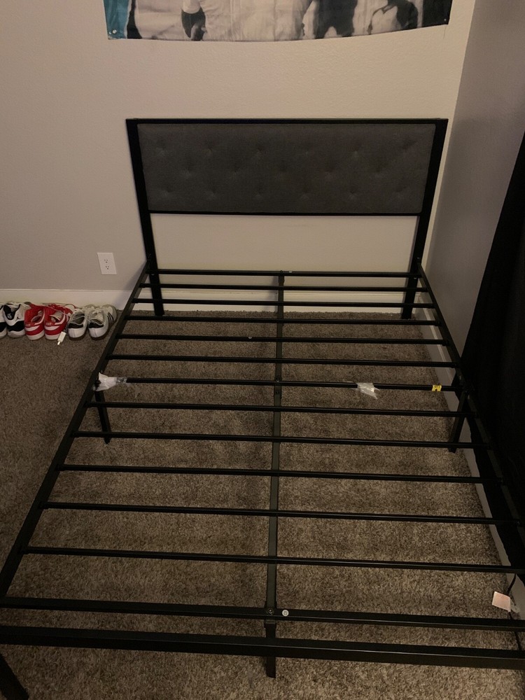 Full-size black and grey metal bed frame in excellent used condition