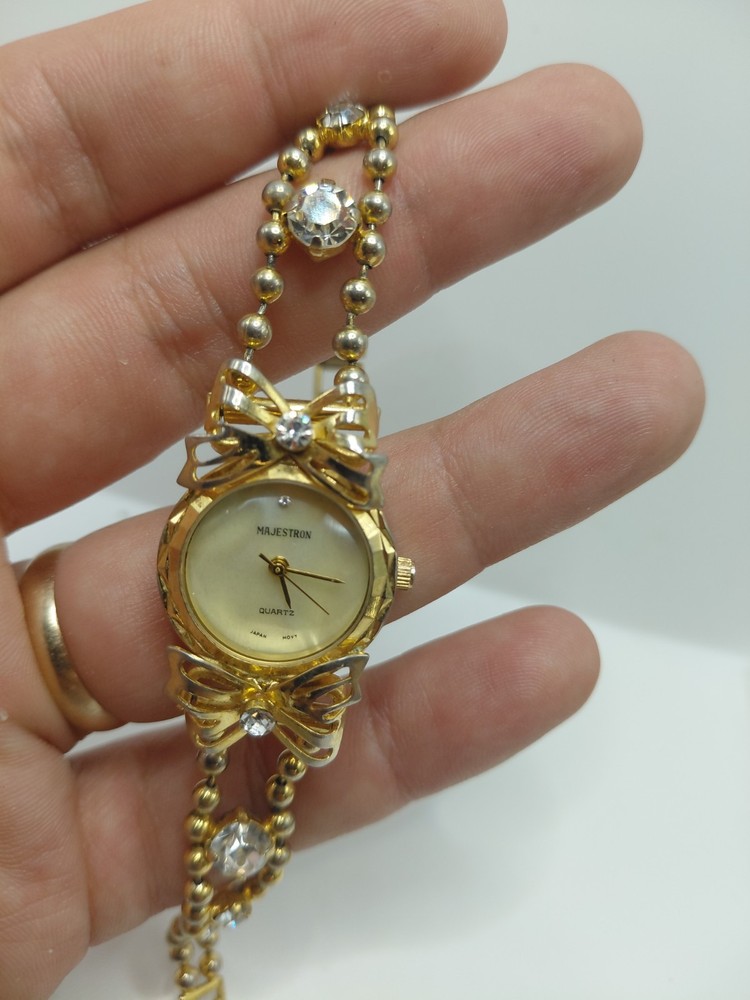 Majestron Women's Gold Quartz Analog Bracelet Bow Crystal Accents Dress Watch