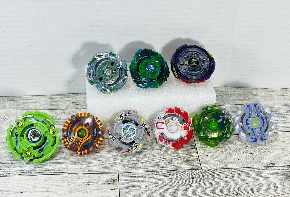 Beyblades Lot Of 9 Hasbro Toys Metal Beyblades.
