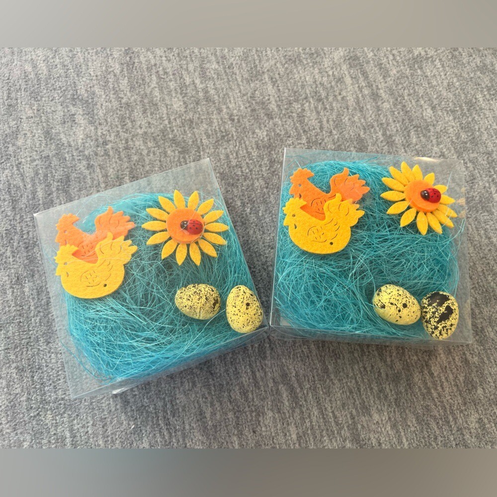 Blue felt Easter basket craft grass with colorful spring DIY boxes