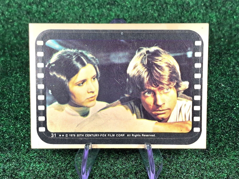 1977 Topps Star Wars Sticker #31 Luke Skywalker Princess Leia