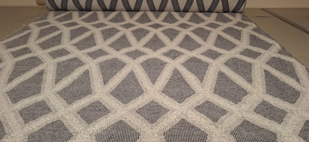 END OF ROLL 4.9 METRE OF BOUCLE WEAVE GEOMETRIC DESIGN UPHOLSTERY FABRIC.