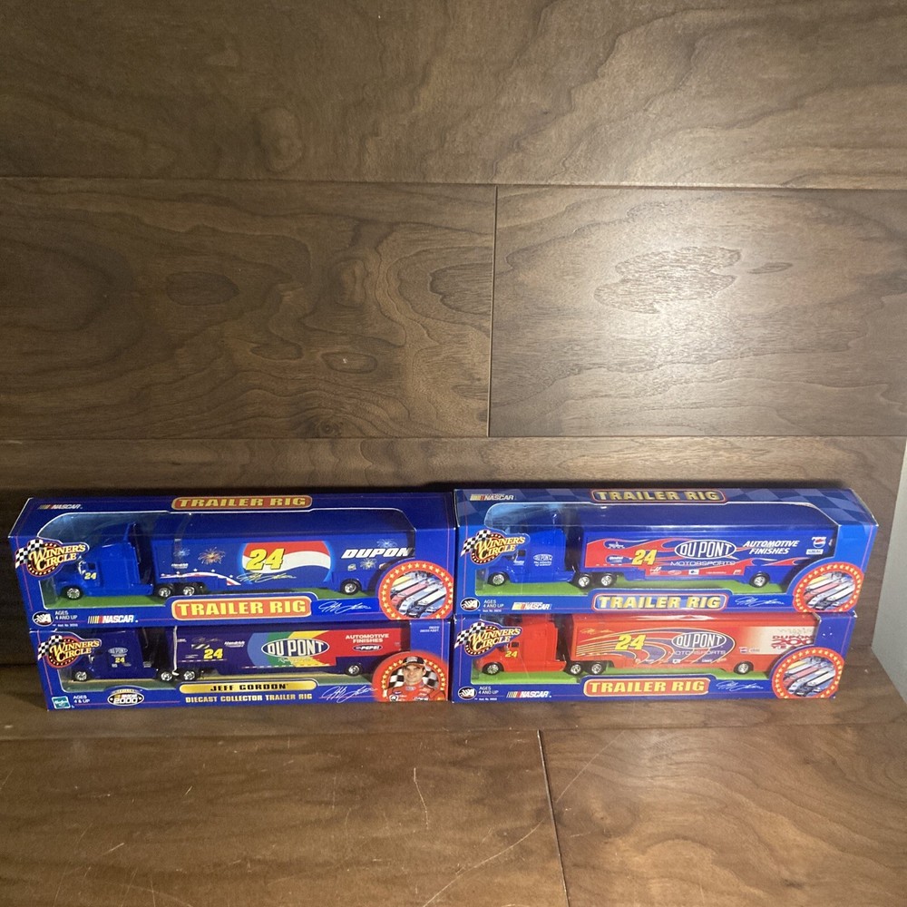 Set Of 4 DuPont #24 Jeff Gordon Trailers Die Cast Rigs, w/ Winner’s Circ Collect