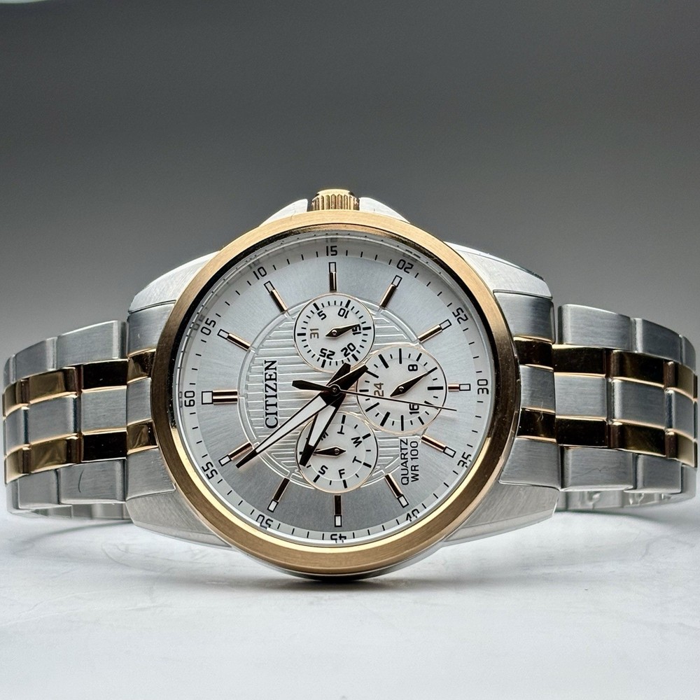 Citizen Men's 42mm Watch Quartz Silver Dial Two Tone Bracelet AG8346-51A