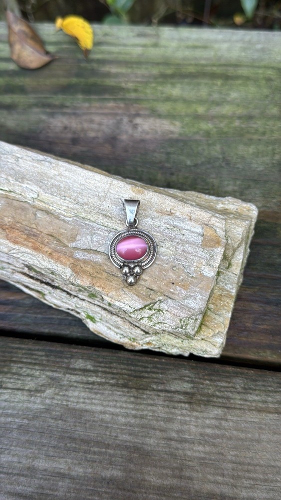 Sterling silver pendant with pink cats eye