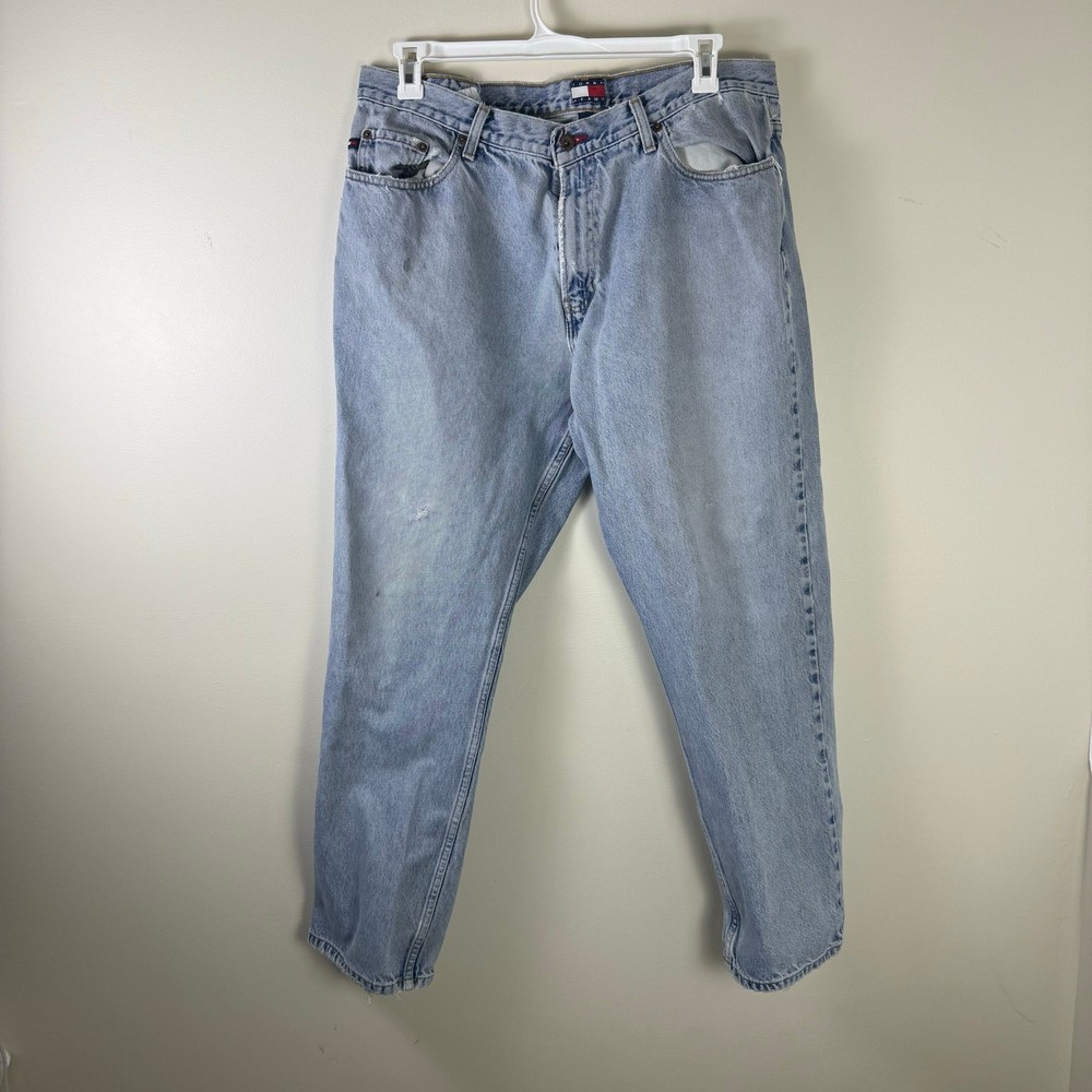 Vintage Tommy Jeans distressed light blue denim streetwear jeans for men size 38x32