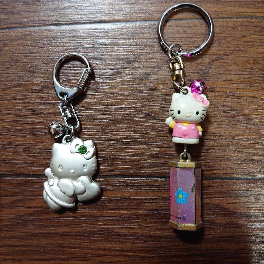 Hello Kitty Retro Silver Heart Keychain with Omikuji Fortune Charm and Yakisoba Cabbage Design