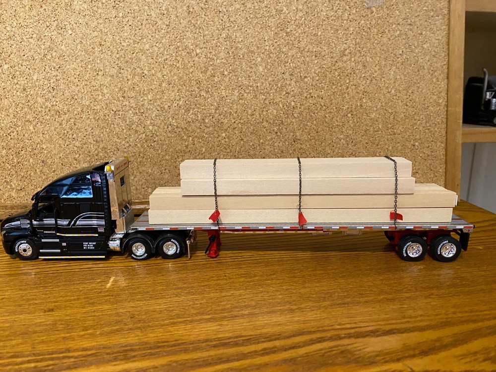 CUSTOMIZED 1/64 DCP MACK ANTHEM & DCP 53 FOOT FLATDECK TRAILER & LUMBER LOAD
