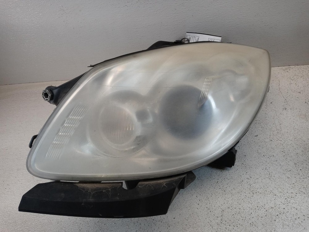 Used Left Headlight Assembly fits: 2008 Buick Enclave w/adjustable headlamps opt