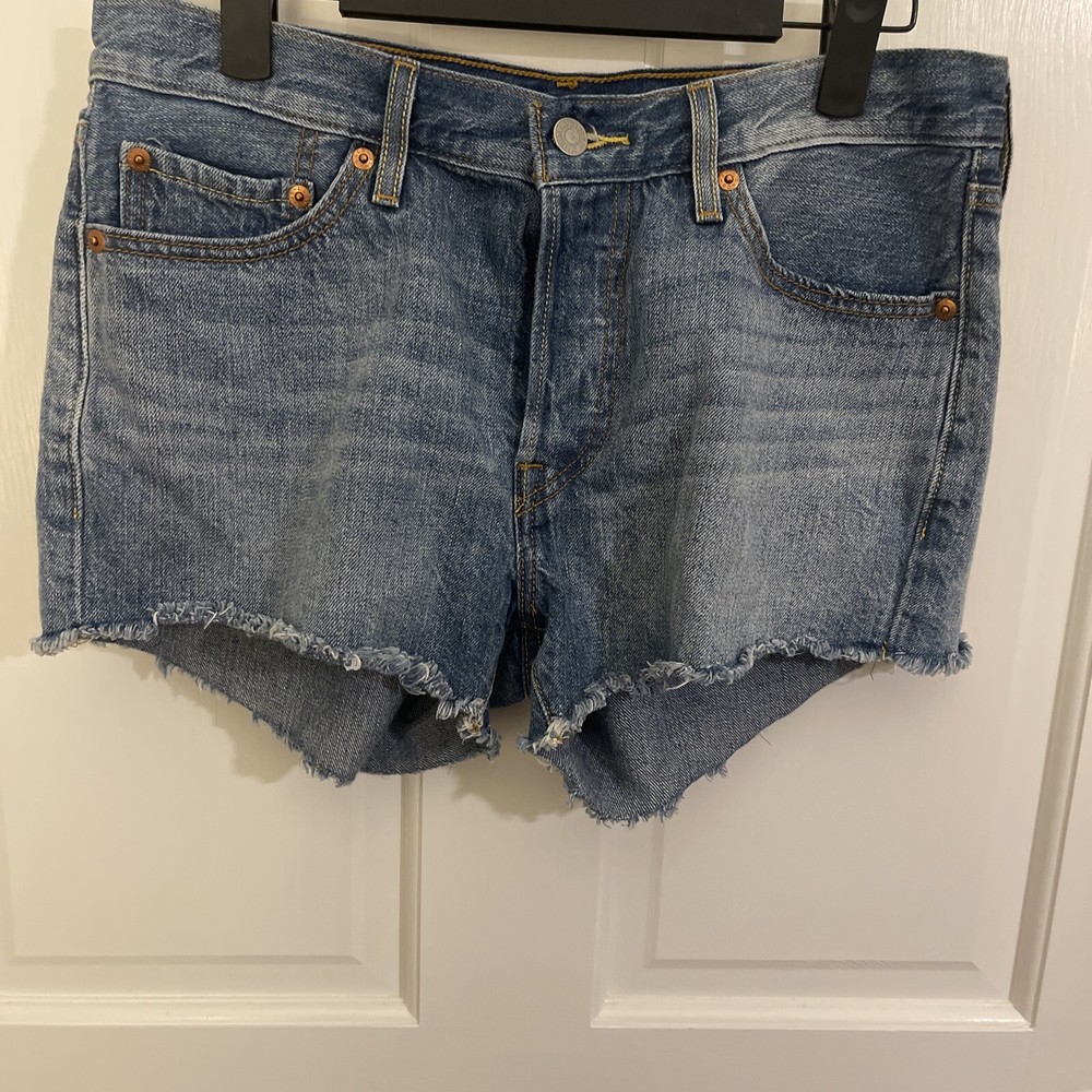 Levi's 501 Jean Women’s Shorts. Size 28 Blue  Button Fly/Raw Hem.