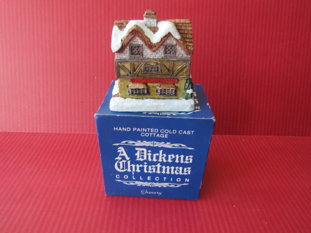 A Dickens Christmas Collection Hand Painted Cold Cast Cottage Grocery