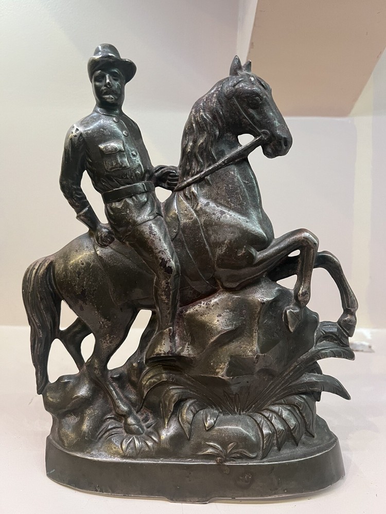 1899 TEDDY ROOSEVELT BRASS PLATED CAST IRON DOORSTOP