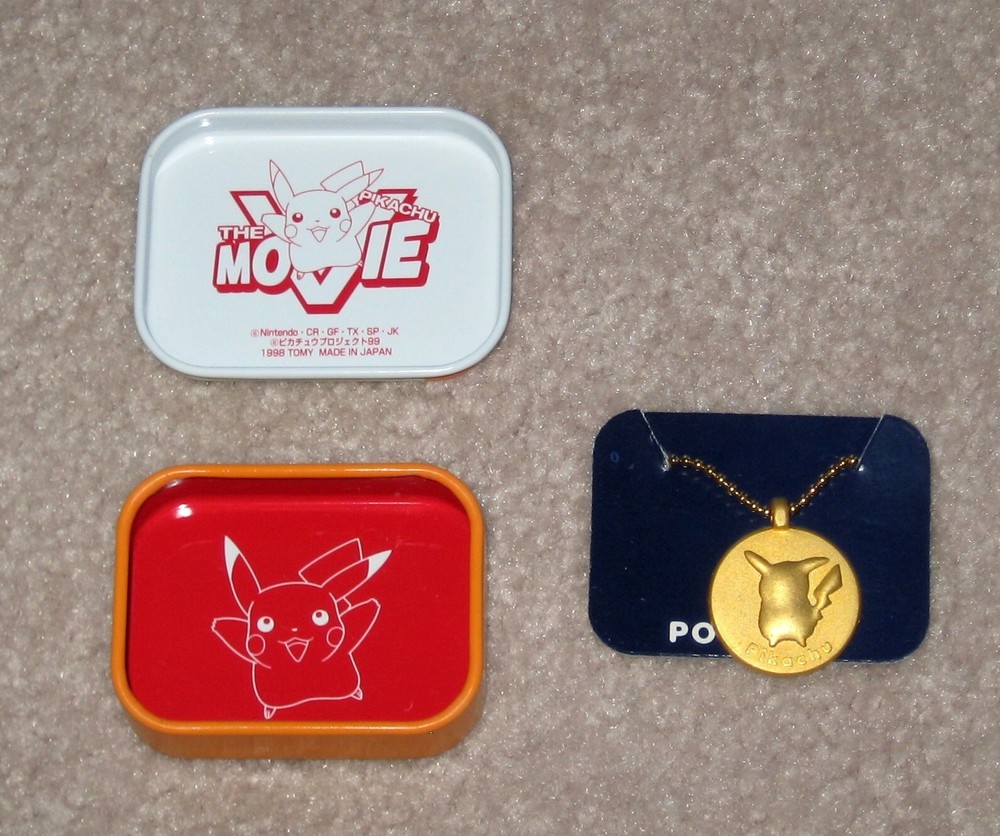 New 1998 Tomy Pokemon Pikachu Movie Promo Tin Set with Pendant