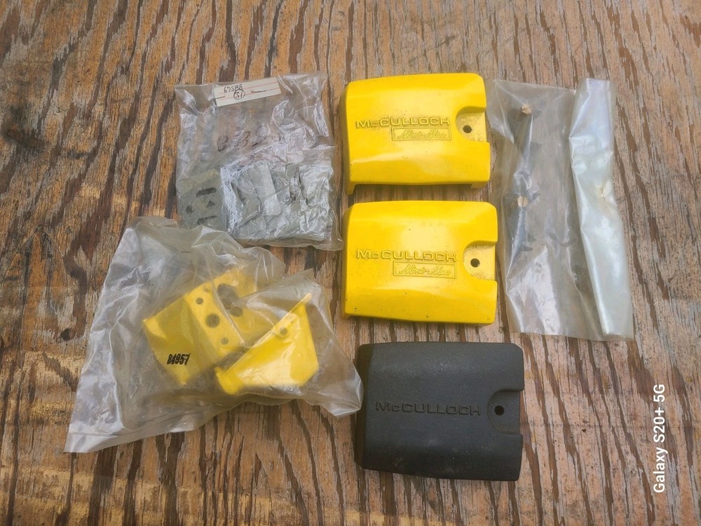 McCulloch Mini Mac Chainsaw Parts Lot Some NOS, Bar Plates, Clutch Covers, Etc
