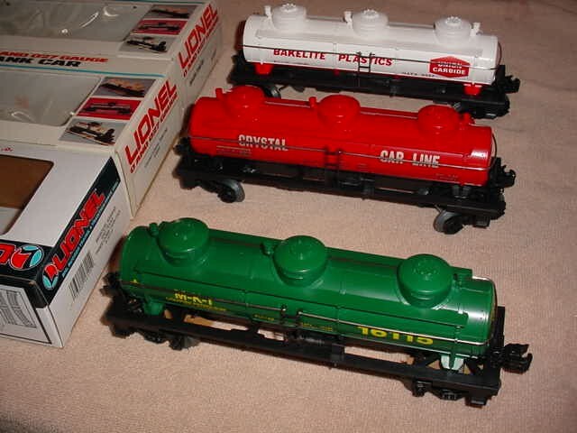 Lionel 3-Dome Tank Cars in Bakelite Crystal and M-K-T 0-027 Gauge