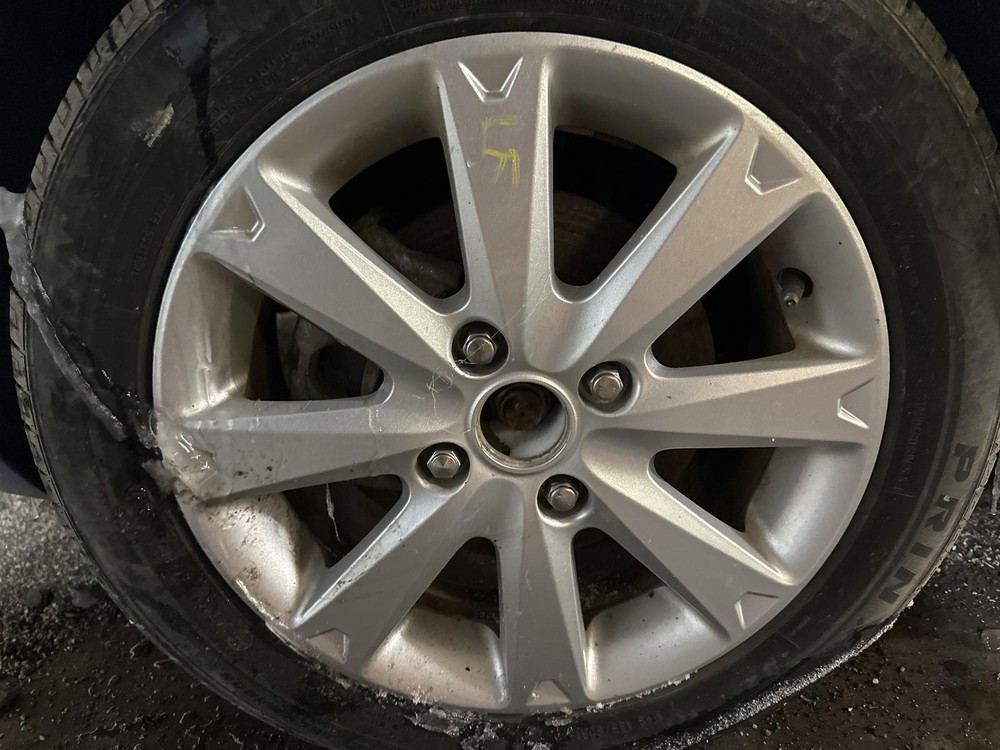 Used Wheel fits: 2011 Ford Fiesta 15x6 aluminum painted 8 spoke Grade A